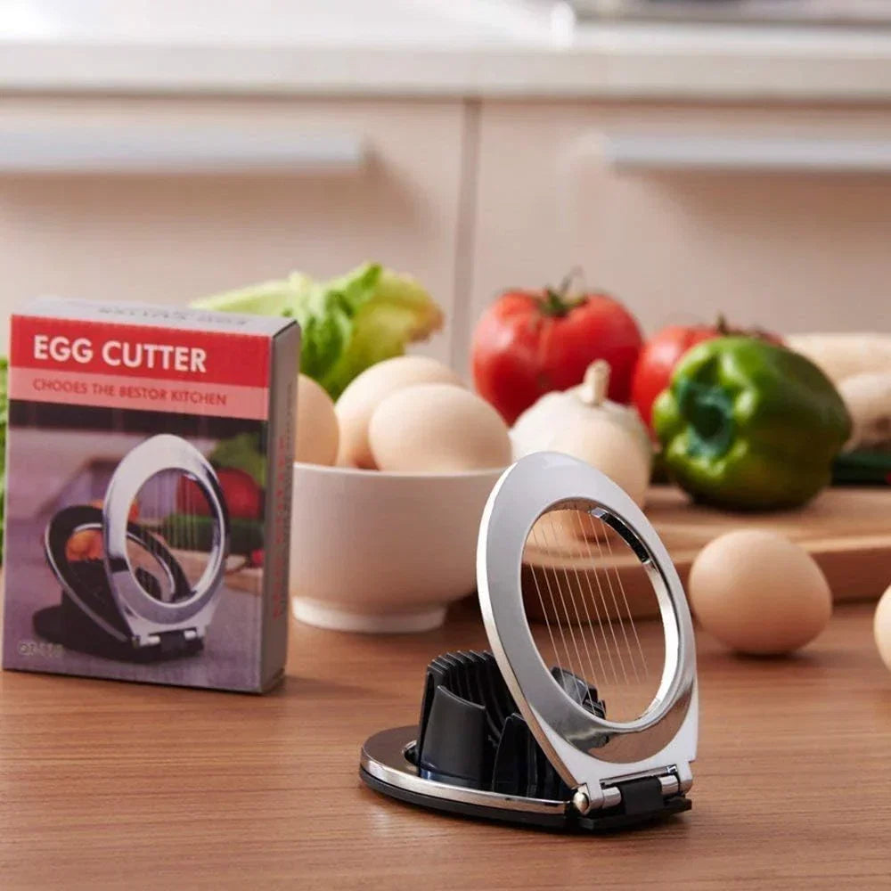 Stainless steel egg divider - slices, wedges & quarters in one