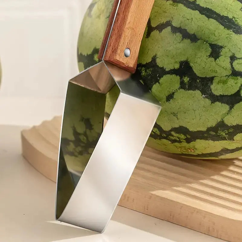 Stainless steel fruit cutter with ergonomic handle