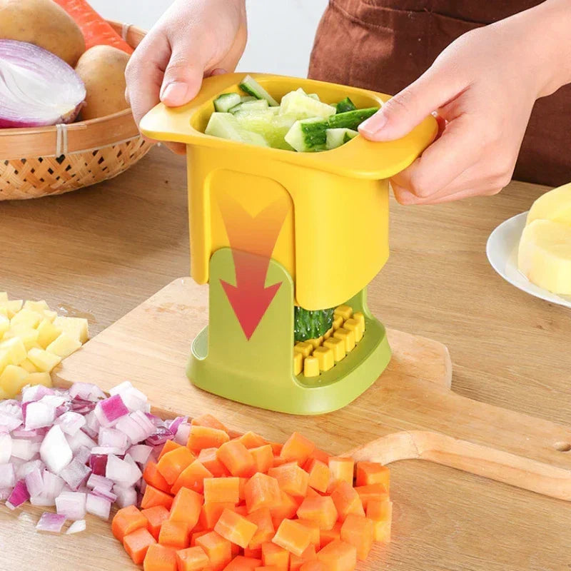 Vegetable cutter hand pressure mechanism for chips and cubes